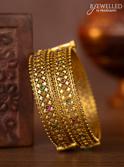 Antique screw type bangles with kemp stones
