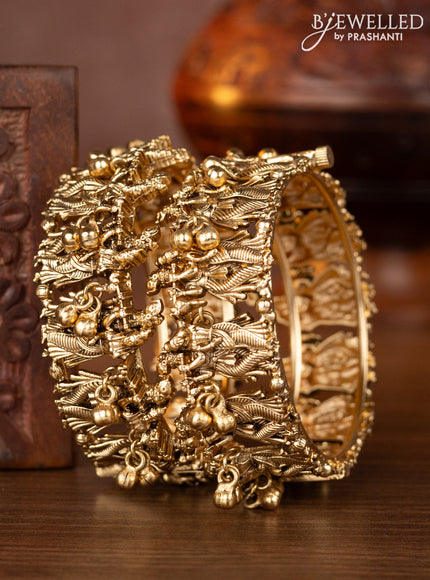 Antique screw type bangles with radha krishna design and golden beads hangings