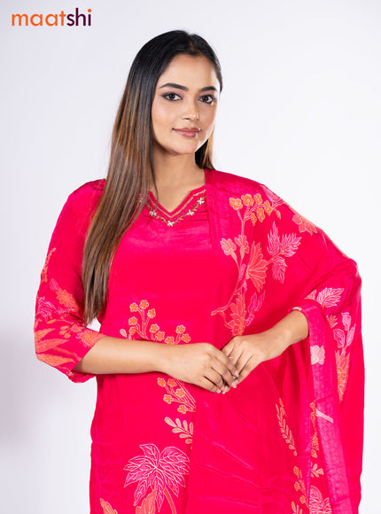 Crepe silk salwar suit pink with placement prints & beaded work neck pattern and straight cut pant & dupatta