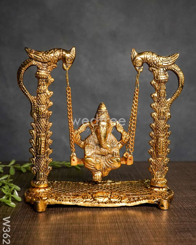 White Metal Ganesha on Swing gold Finish - W3629