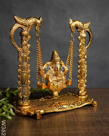 White Metal Ganesha on Swing gold Finish - W3629