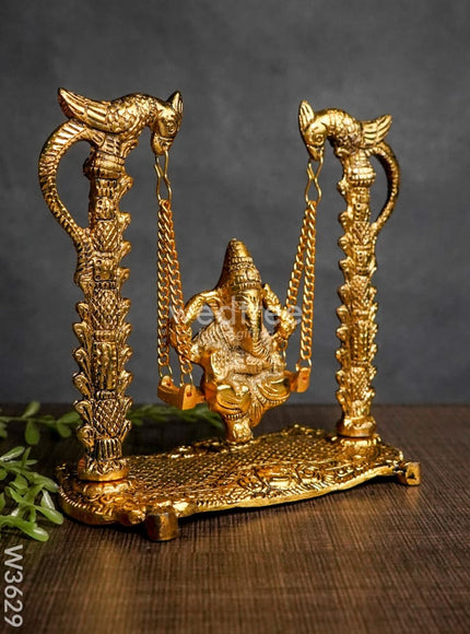 White Metal Ganesha on Swing gold Finish - W3629